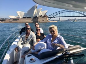 US social media influencers on the boat in Sydney Harbour.